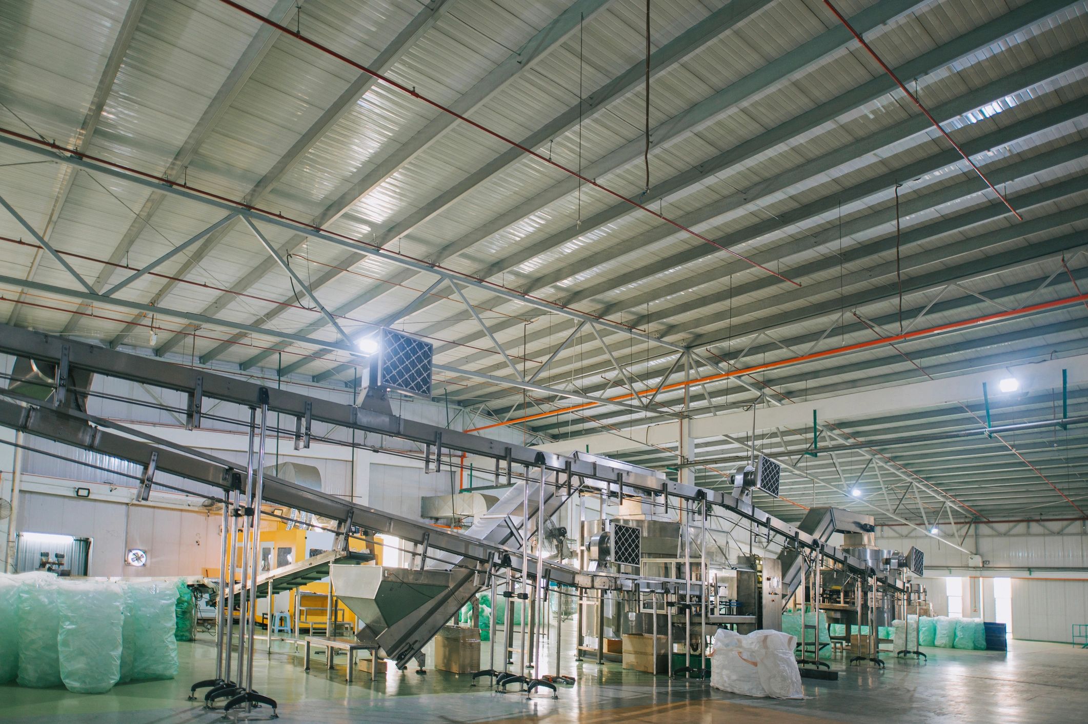 Food production line with bottled products in a factory