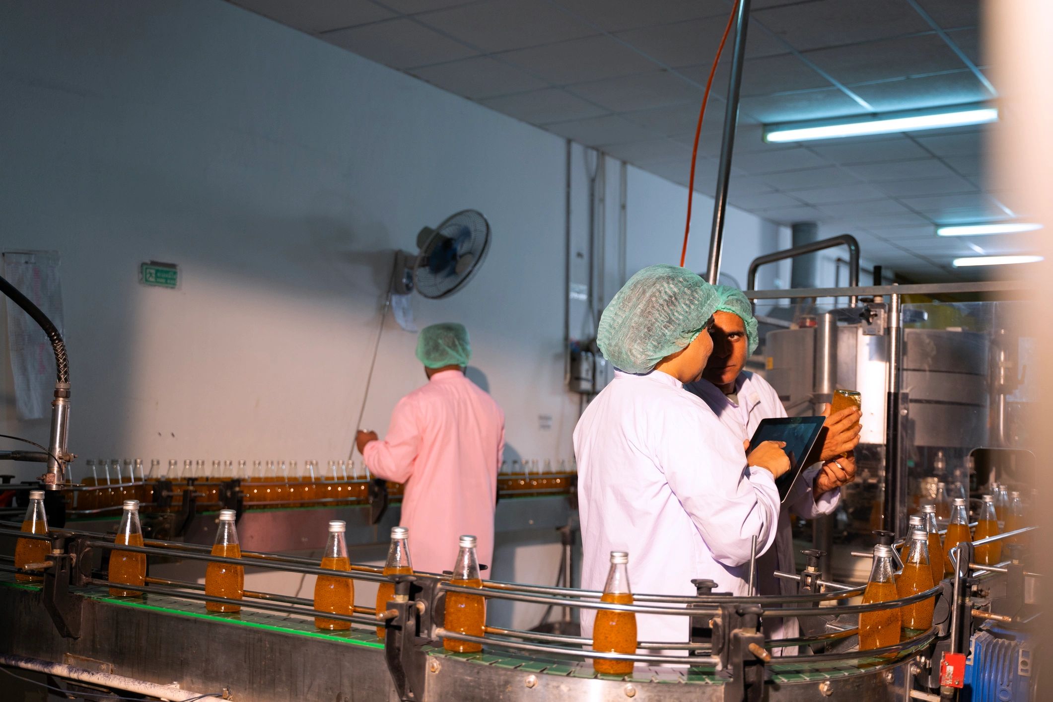Employees working in a modern production facility