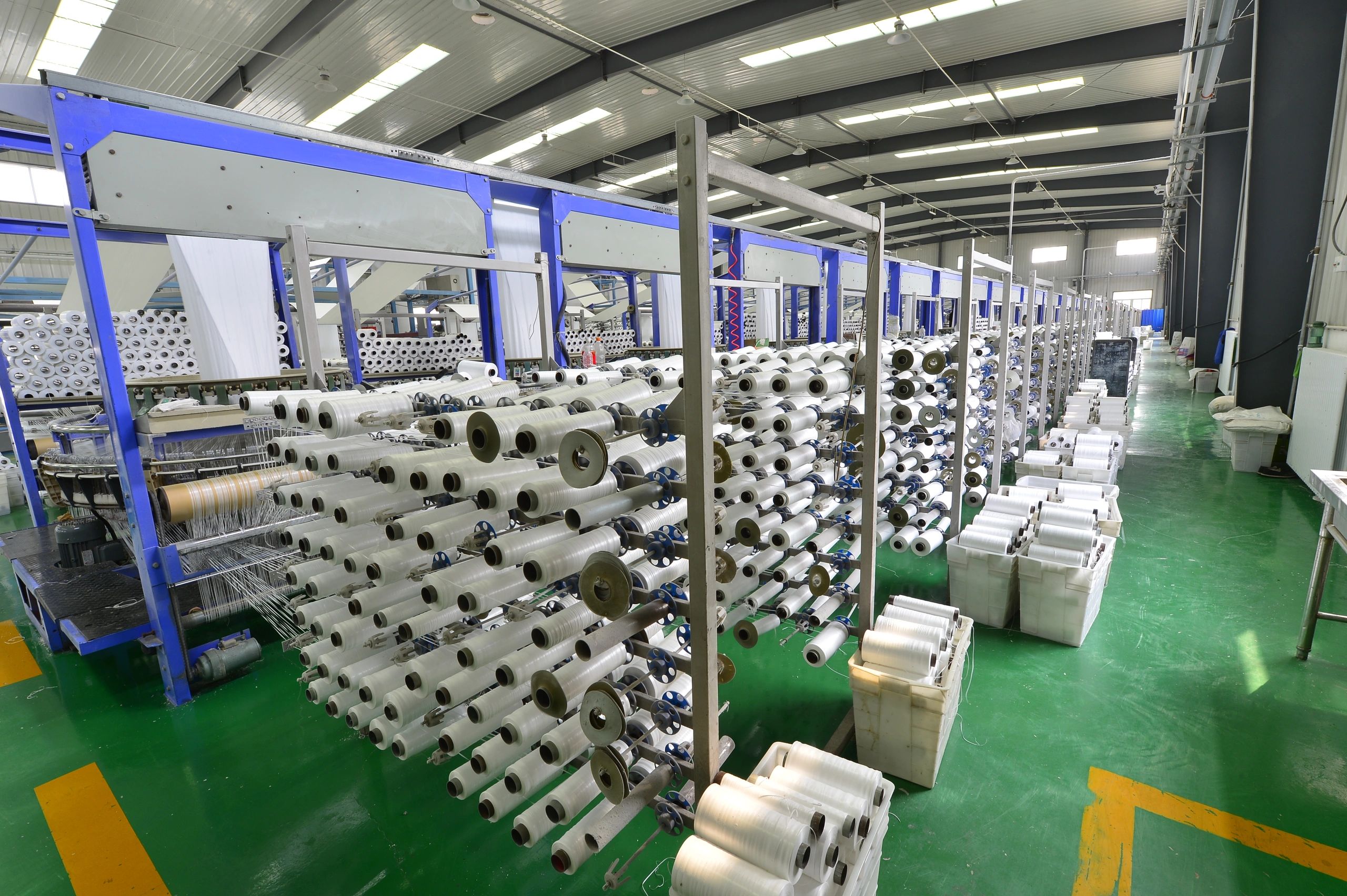 Modern plastic packaging production line in a manufacturing facility